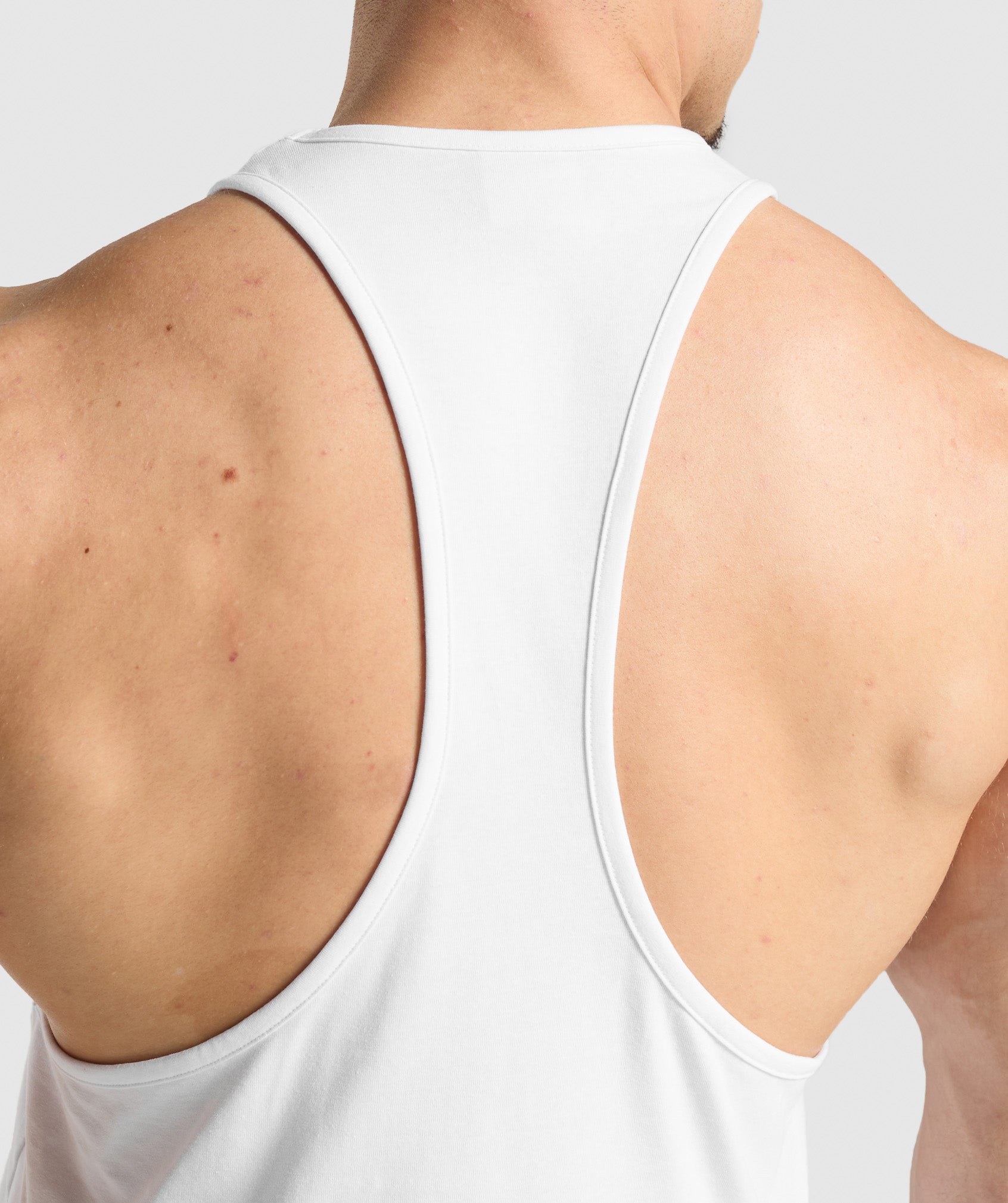 gymshark-critical-stringer-sleeveless-tops-white-ss25