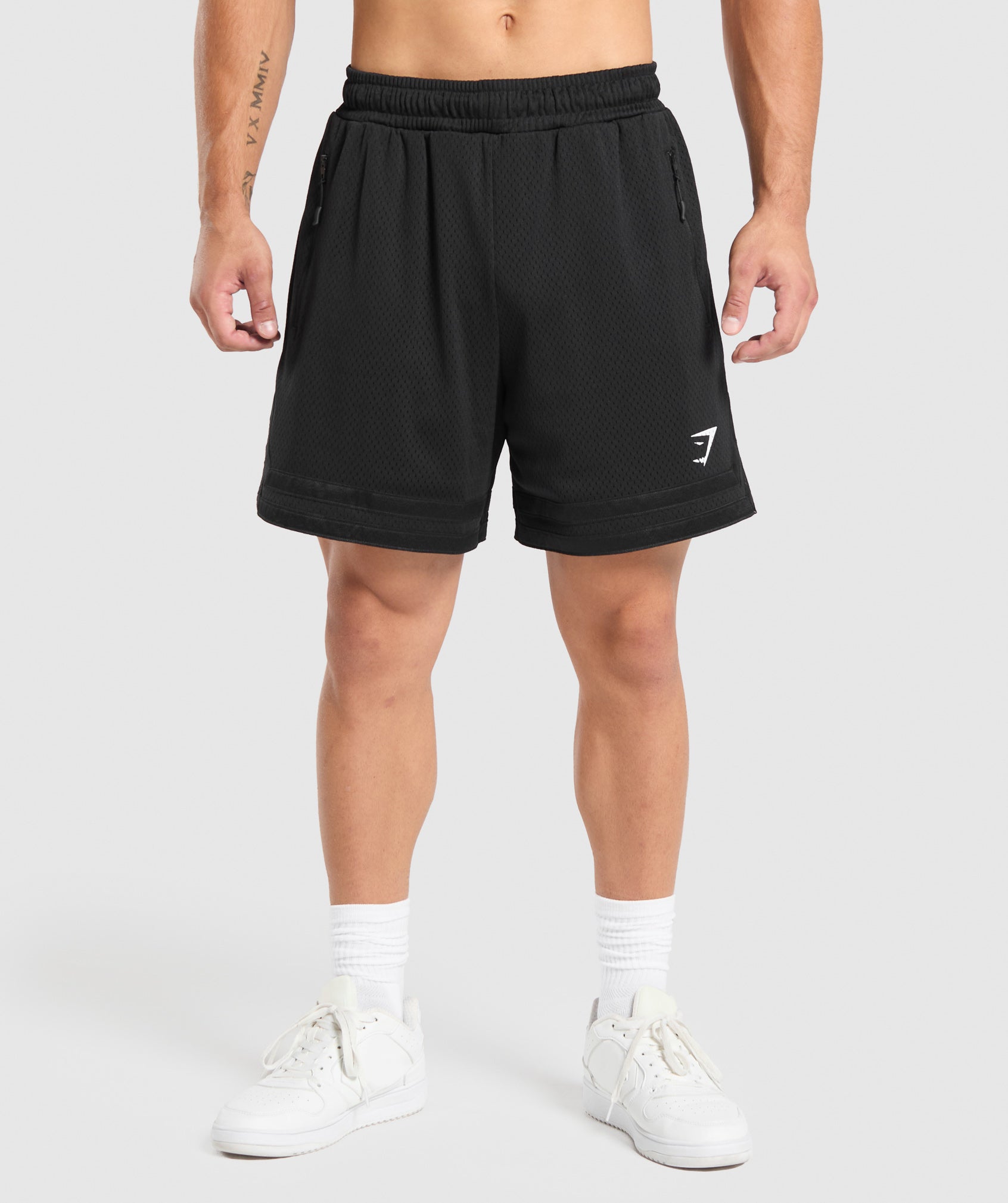 gymshark-varsity-mesh-shorts-black-white-logo-aw24