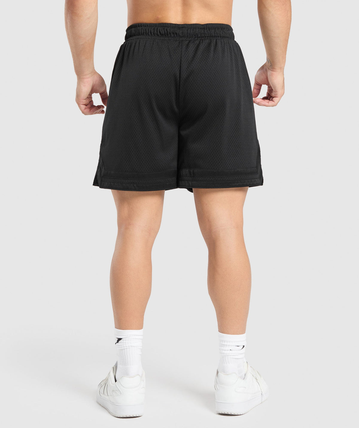 gymshark-varsity-mesh-shorts-black-white-logo-aw24