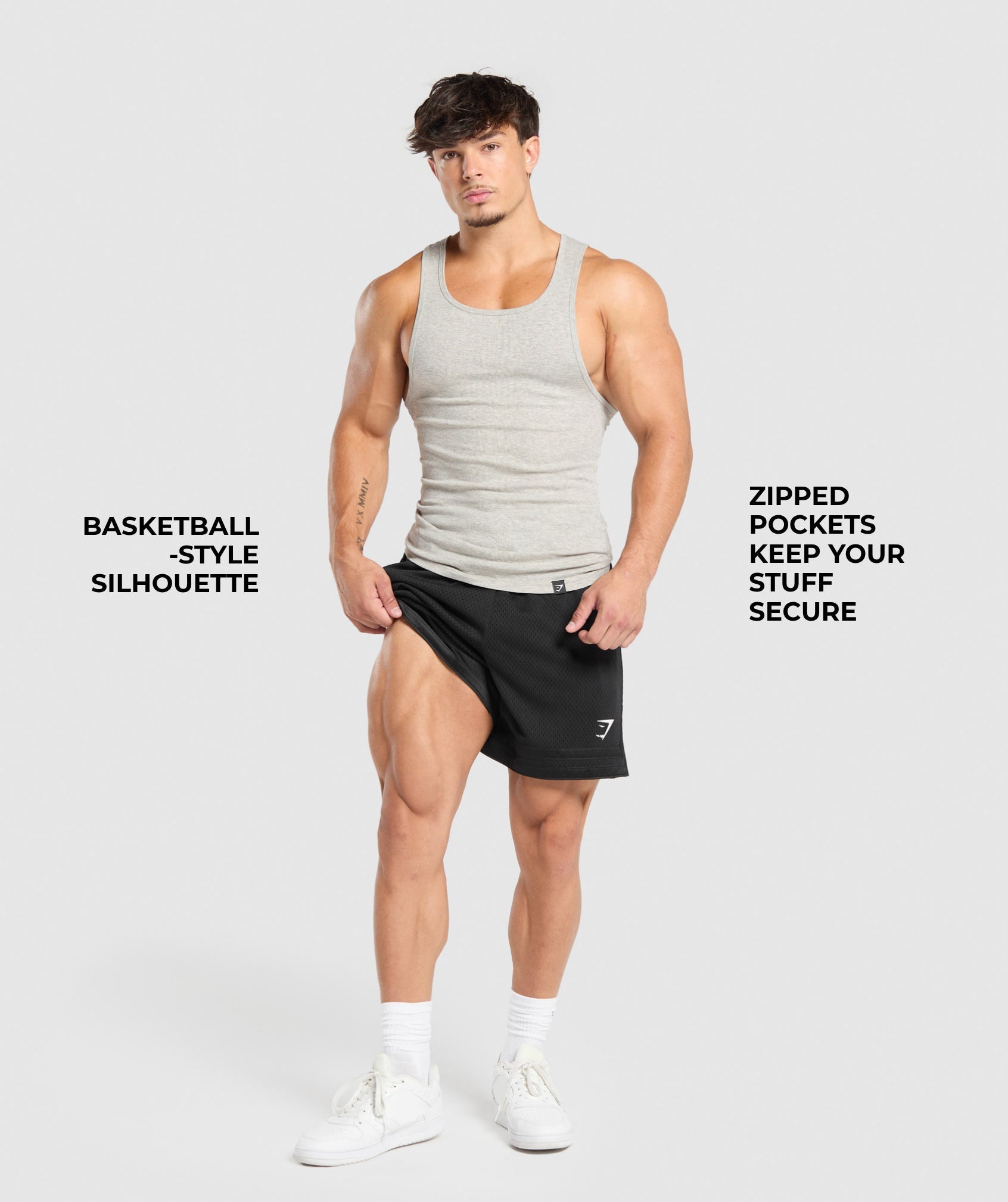 gymshark-varsity-mesh-shorts-black-white-logo-aw24