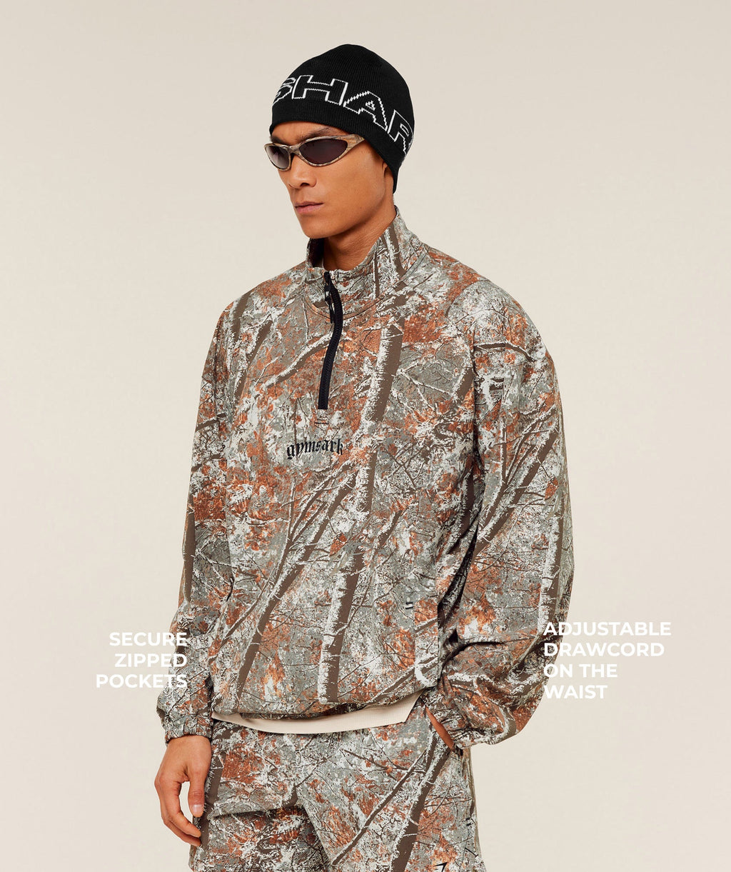 gymshark-tactical-shell-1-4-zip-pullovers-brown-aw25