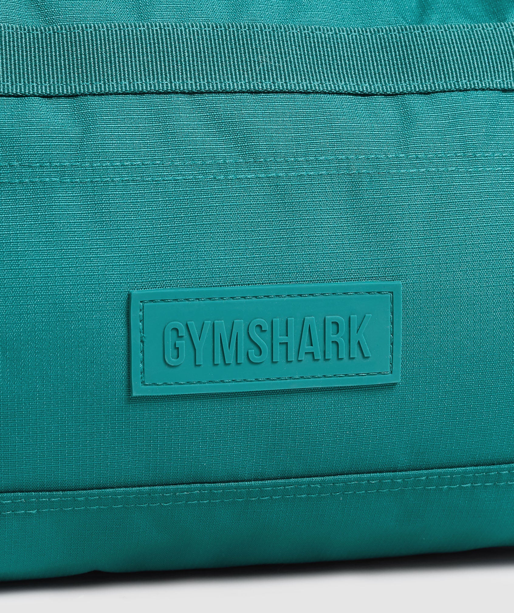 gymshark-active-holdall-small-bags-teal-ss25
