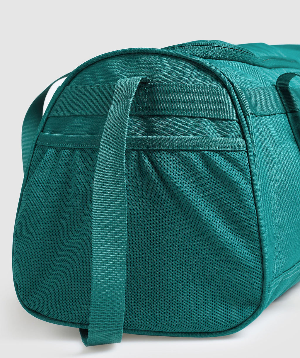 gymshark-active-holdall-small-bags-teal-ss25