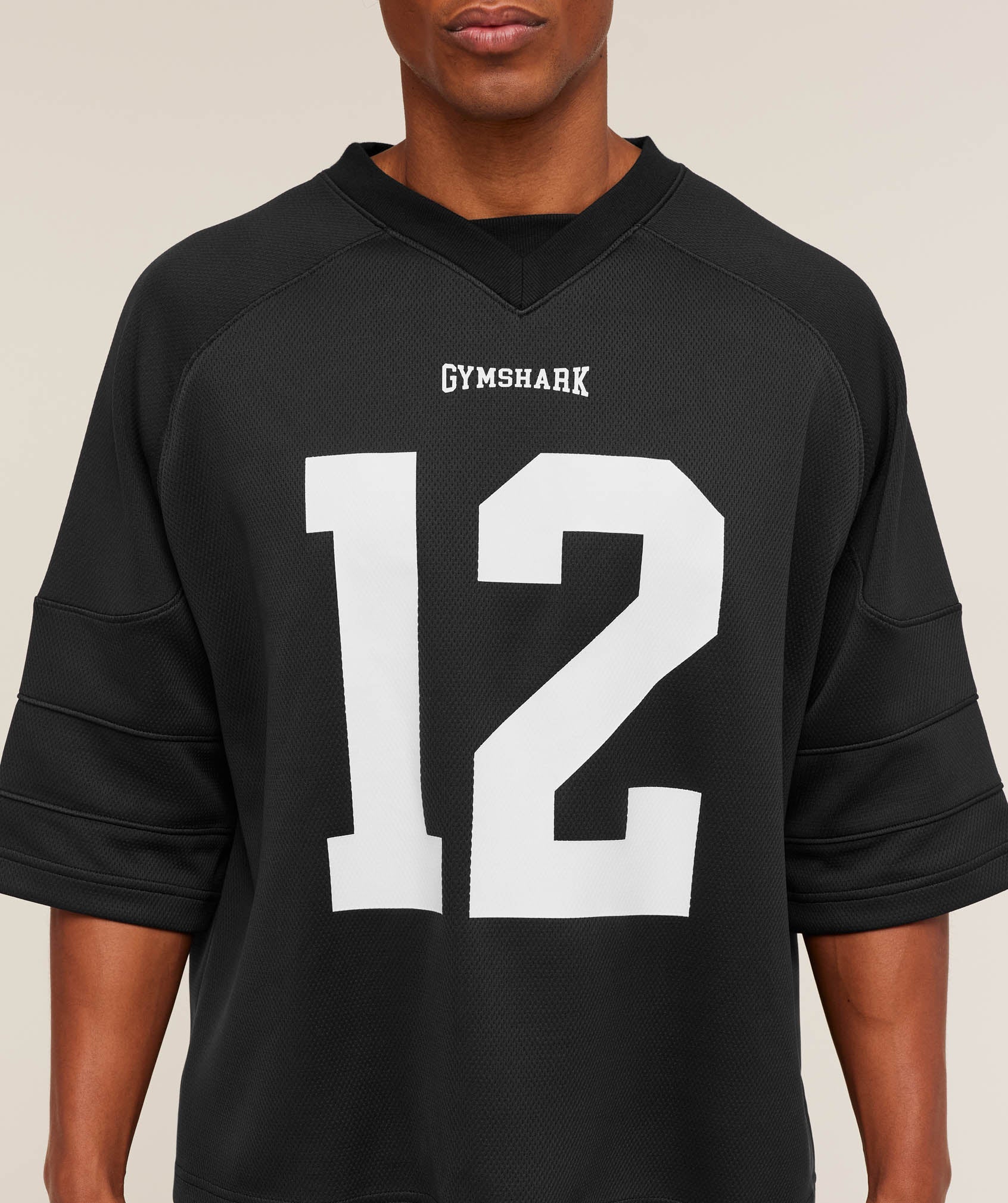 gymshark-american-football-jersey-ss-tops-black-aw25