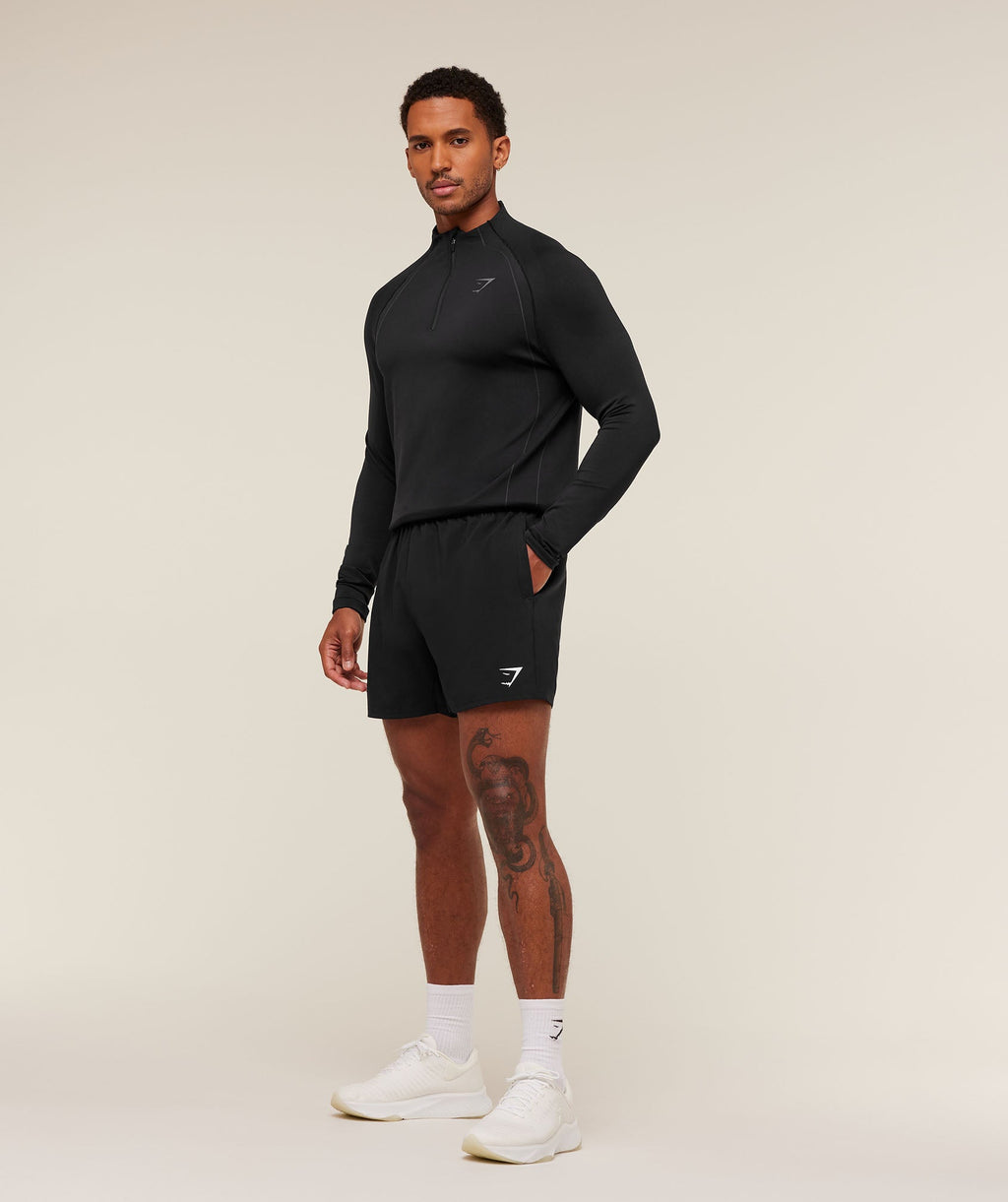 gymshark-apex-seamless-1-4-zip-black-dark-grey-aw24