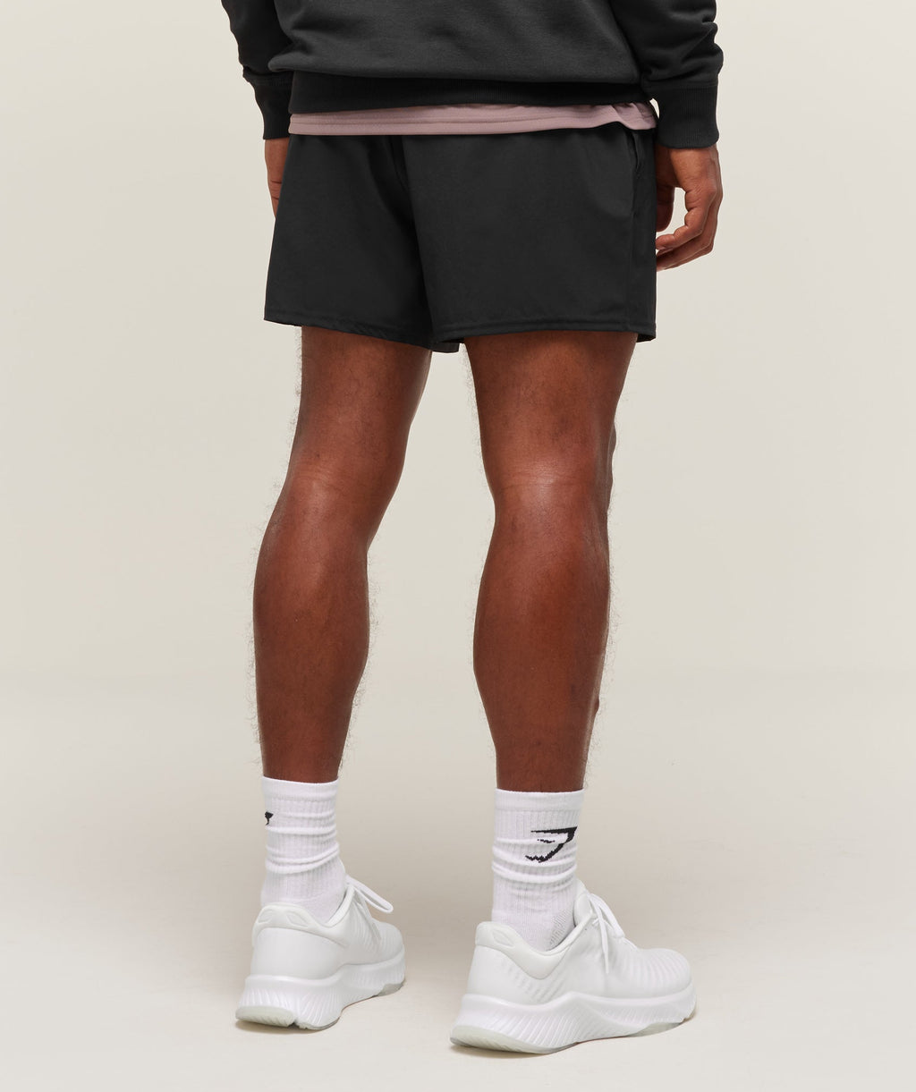 gymshark-arrival-5-shorts-black-ss22
