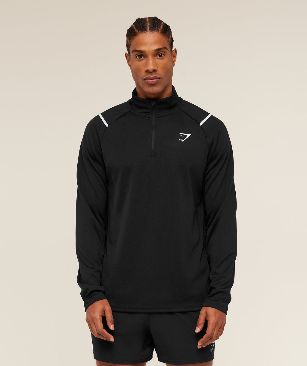 gymshark-arrival-contrast-1-4-zip-pullovers-black-ss26