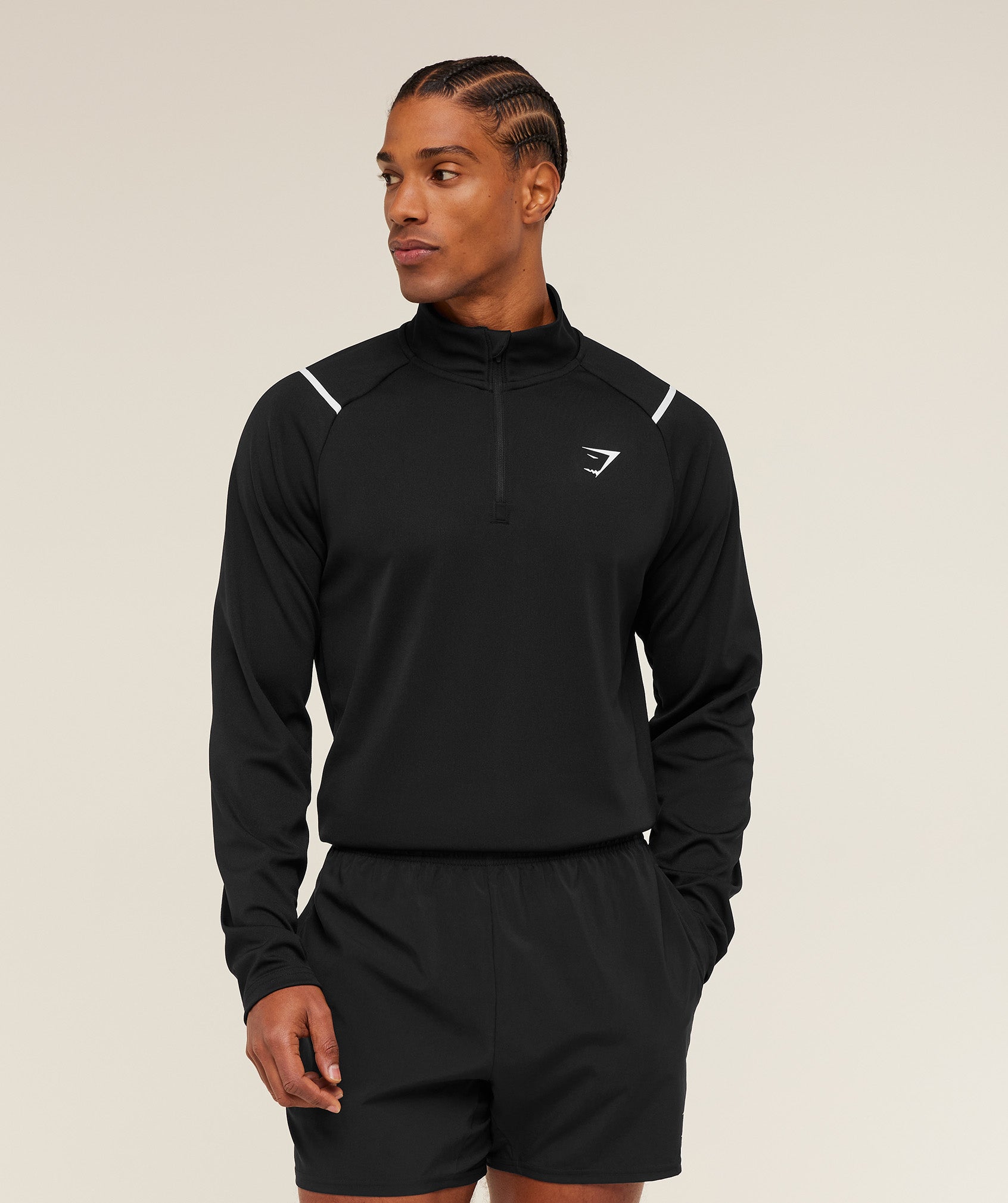 gymshark-arrival-contrast-1-4-zip-pullovers-black-ss26