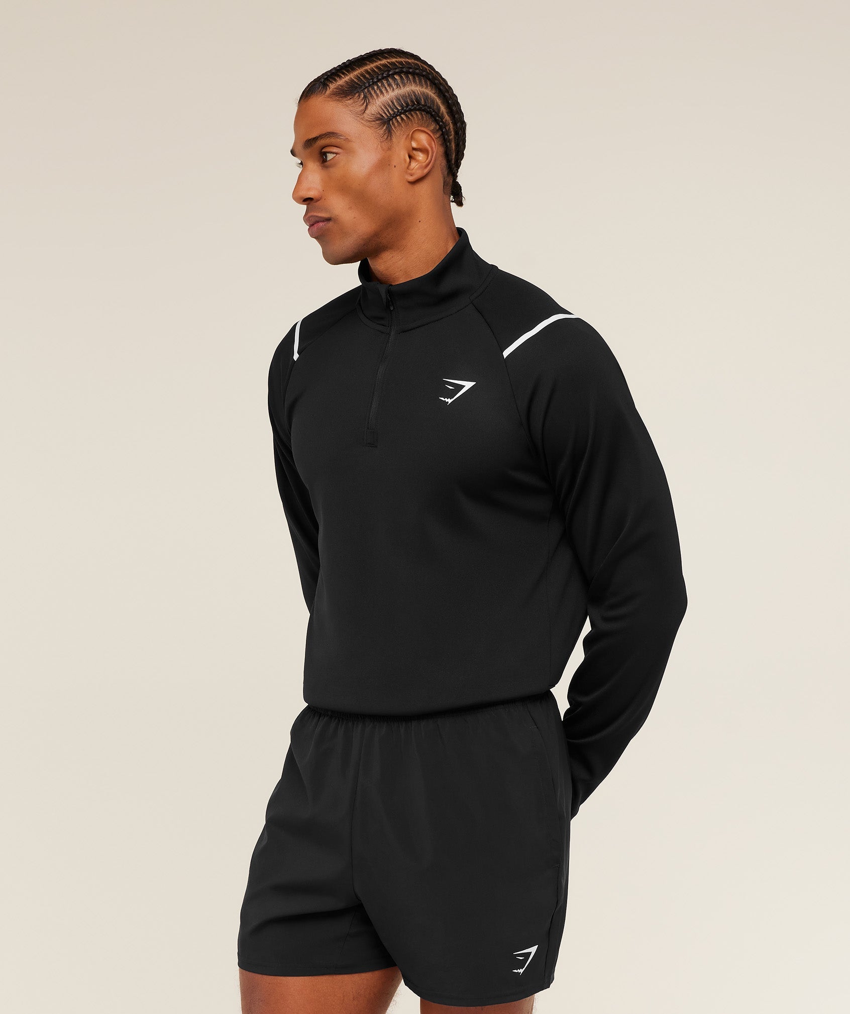 gymshark-arrival-contrast-1-4-zip-pullovers-black-ss26