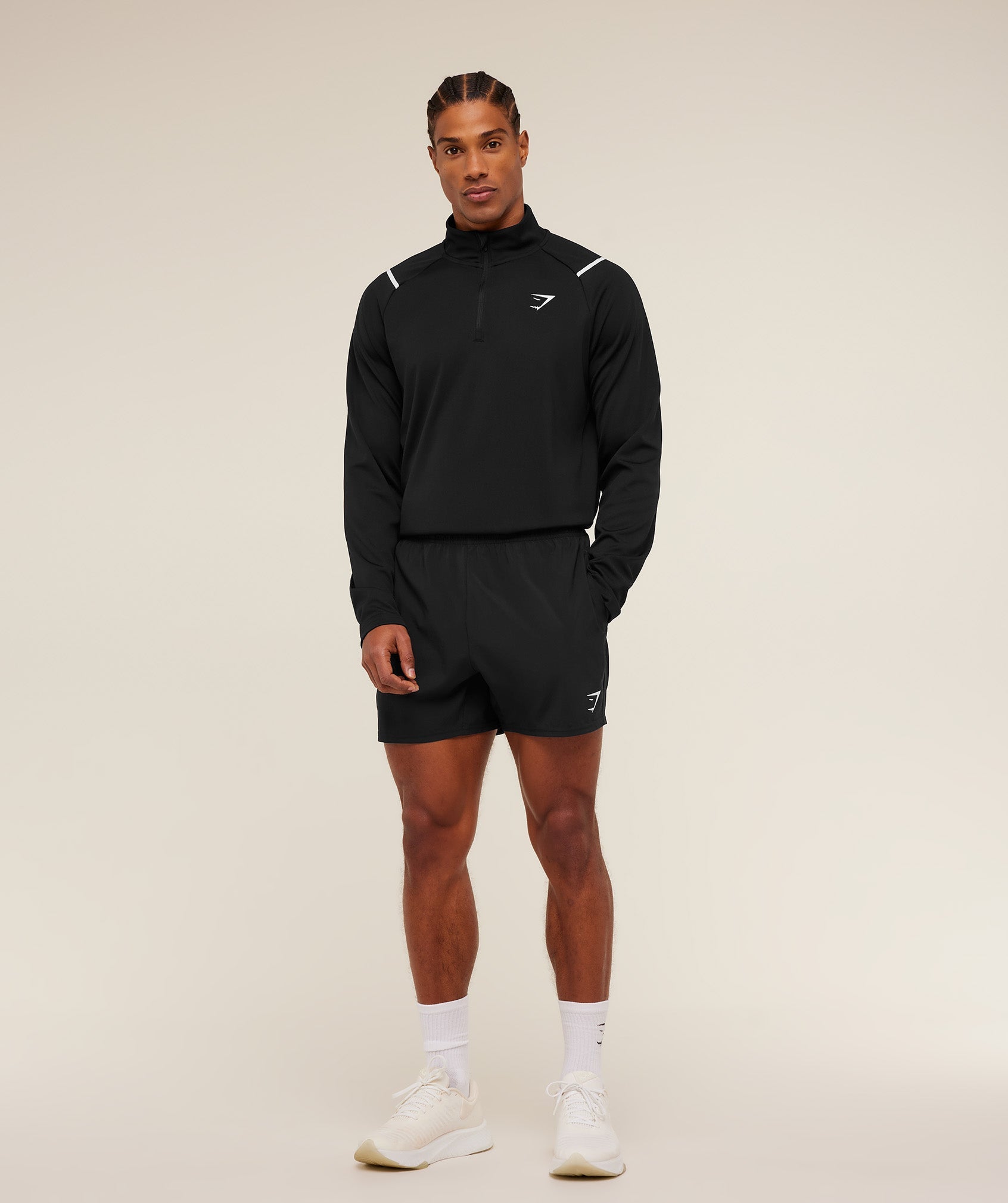gymshark-arrival-contrast-1-4-zip-pullovers-black-ss26