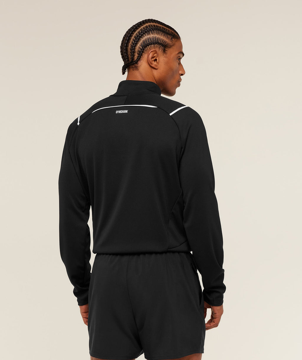 gymshark-arrival-contrast-1-4-zip-pullovers-black-ss26