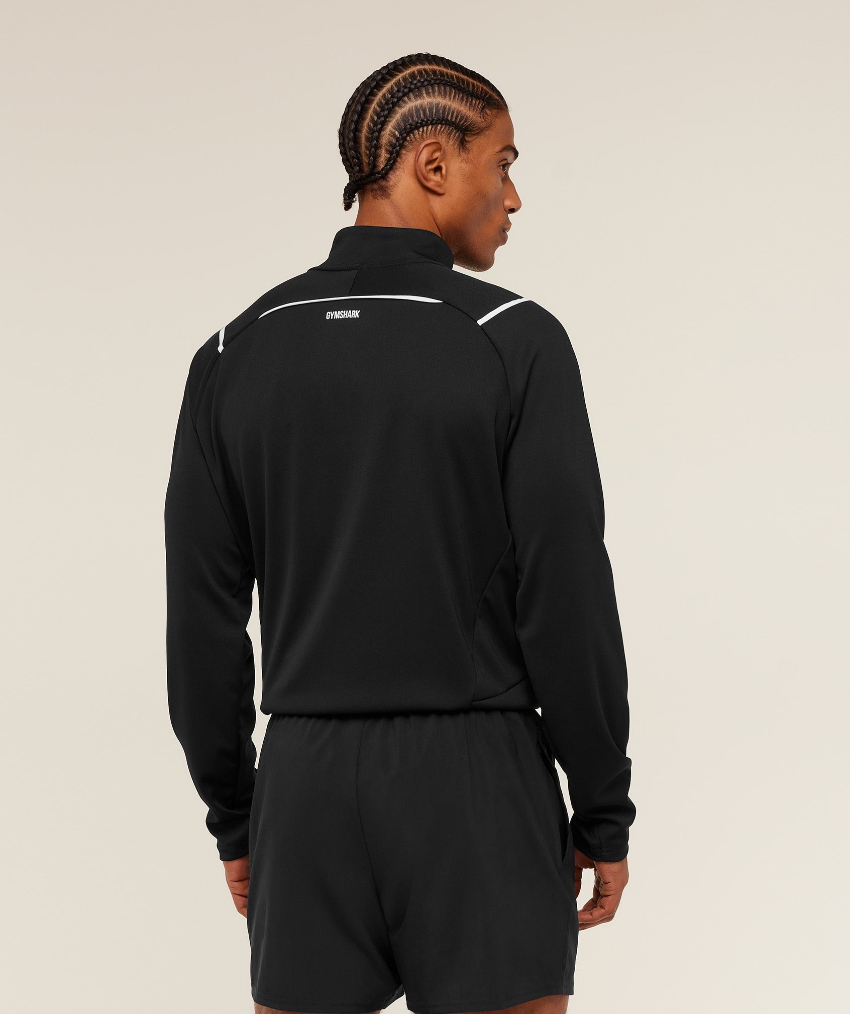 gymshark-arrival-contrast-1-4-zip-pullovers-black-ss26