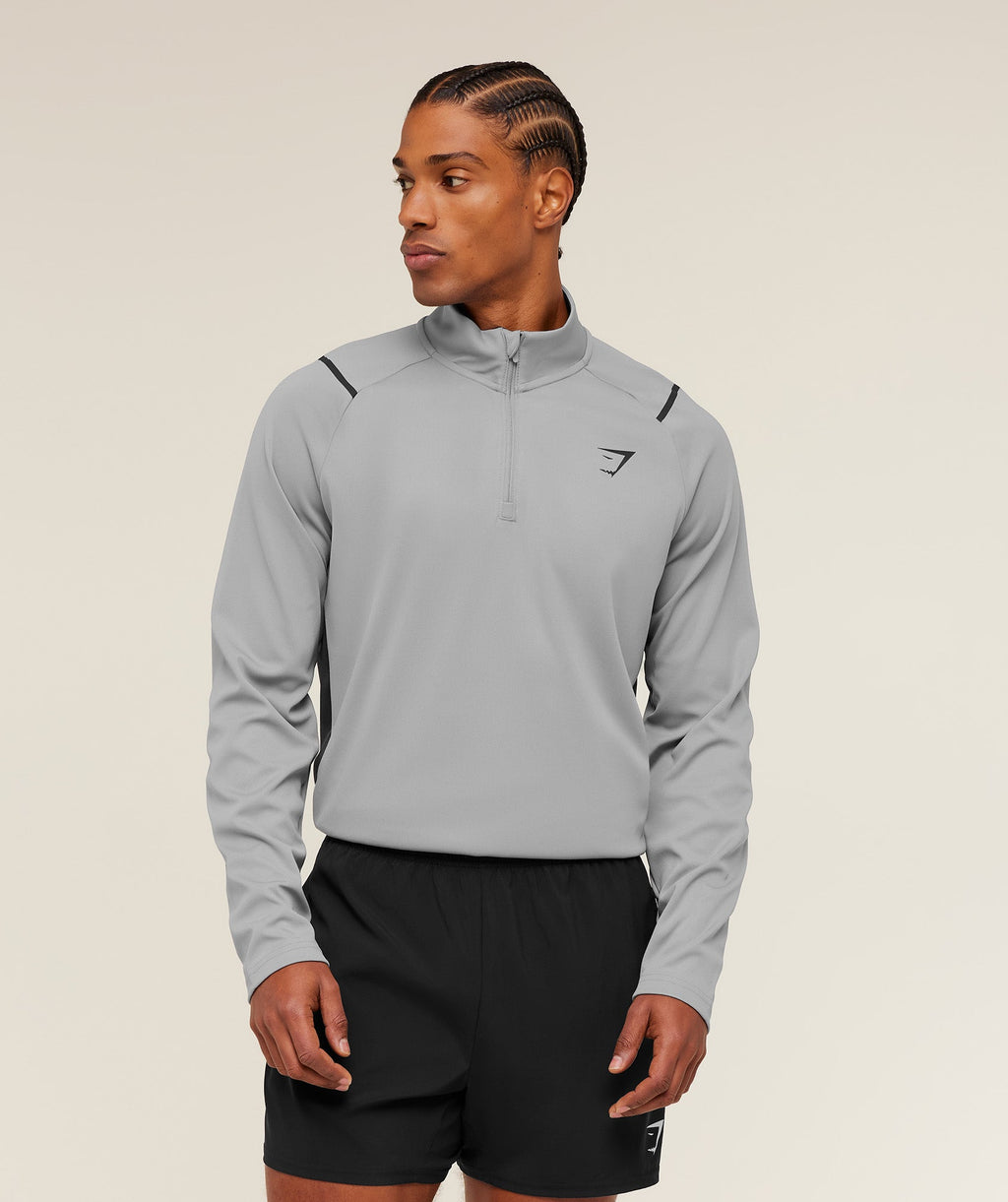 gymshark-arrival-contrast-1-4-zip-pullovers