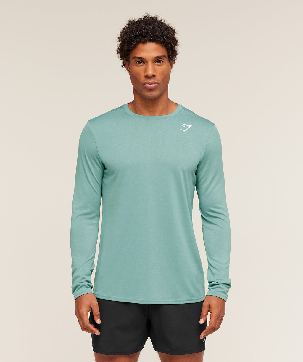 gymshark-arrival-long-sleeve-t-shirt-ls-tops-teal-aw25
