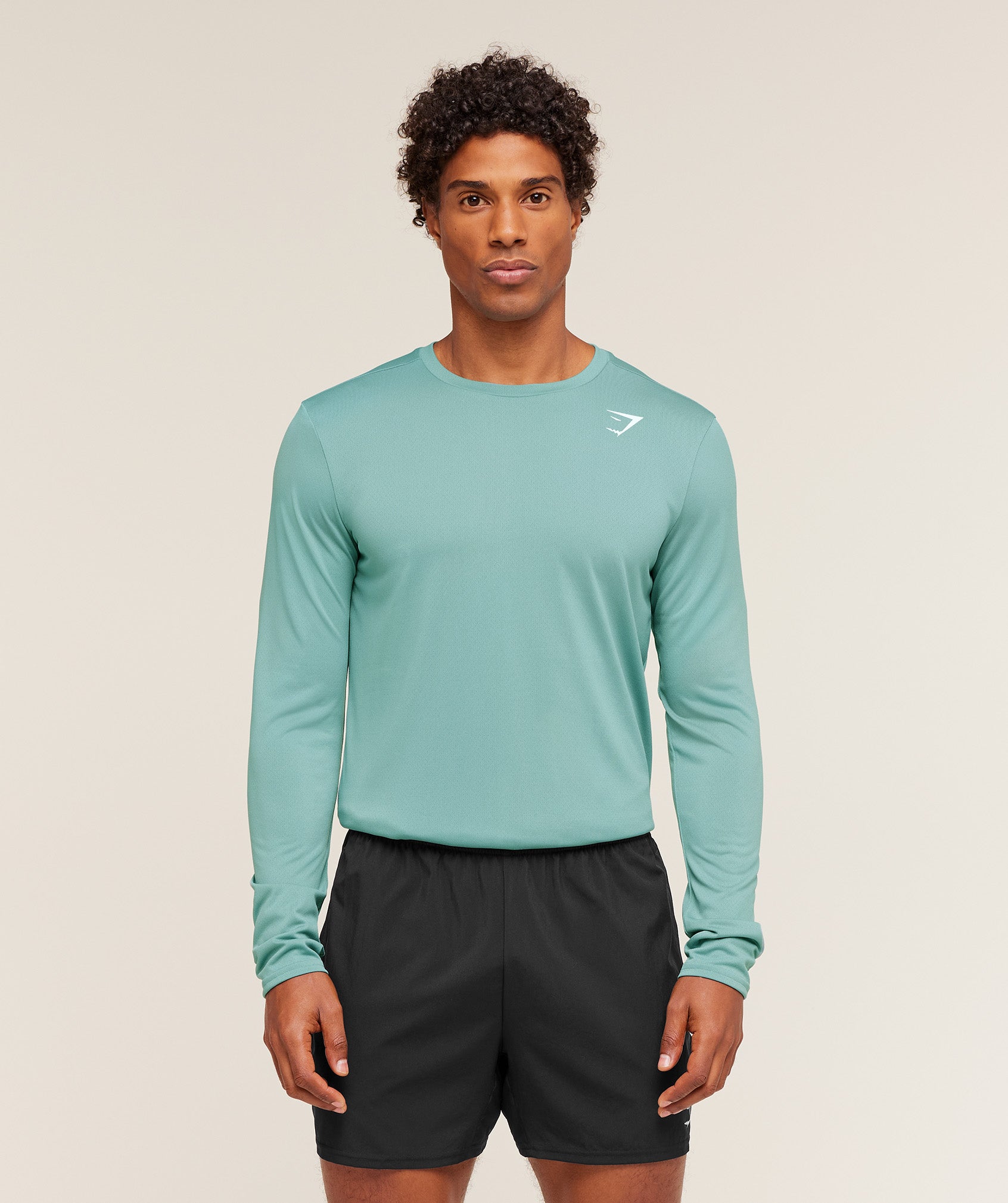 gymshark-arrival-long-sleeve-t-shirt-ls-tops-teal-aw25