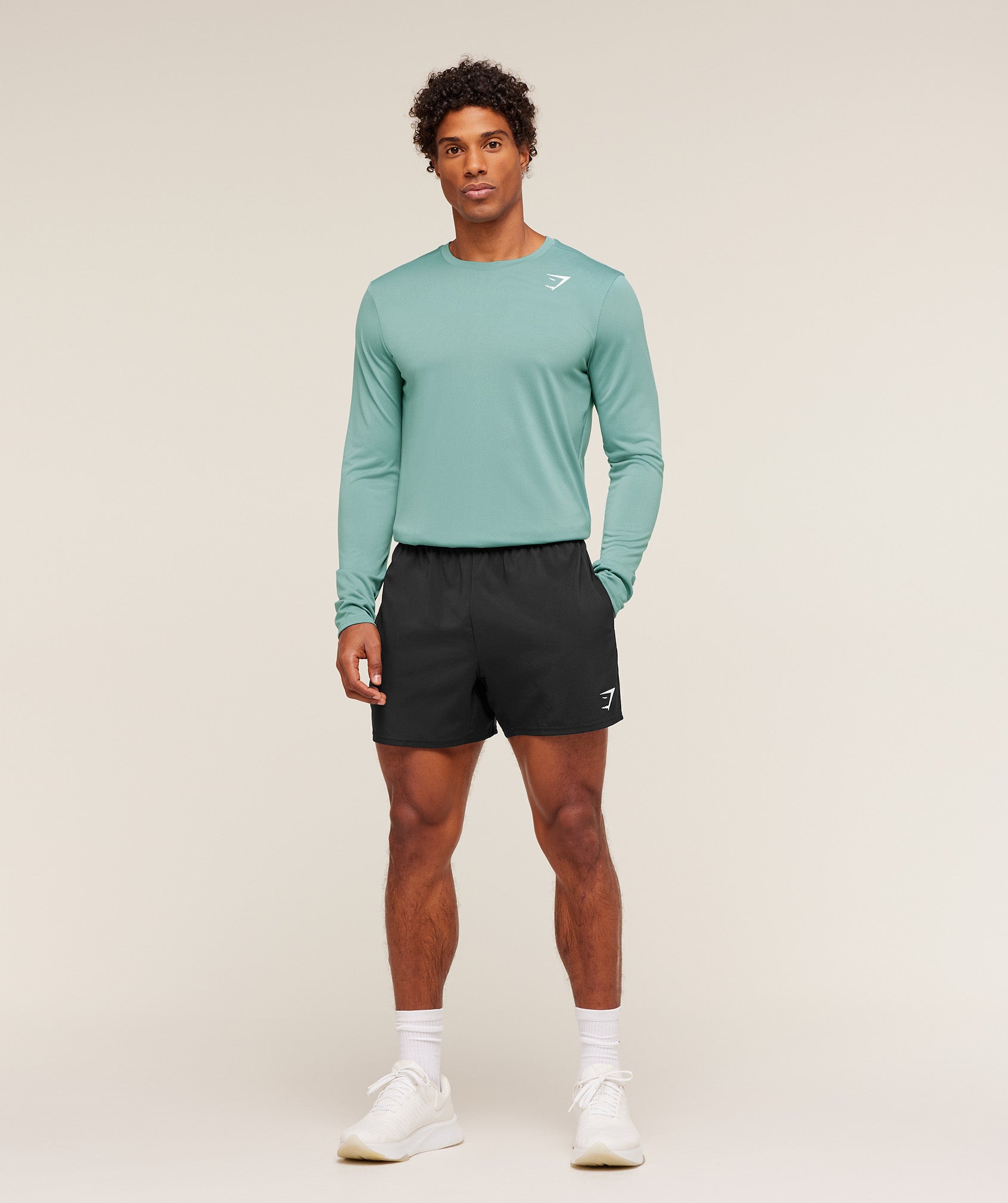 gymshark-arrival-long-sleeve-t-shirt-ls-tops-teal-aw25