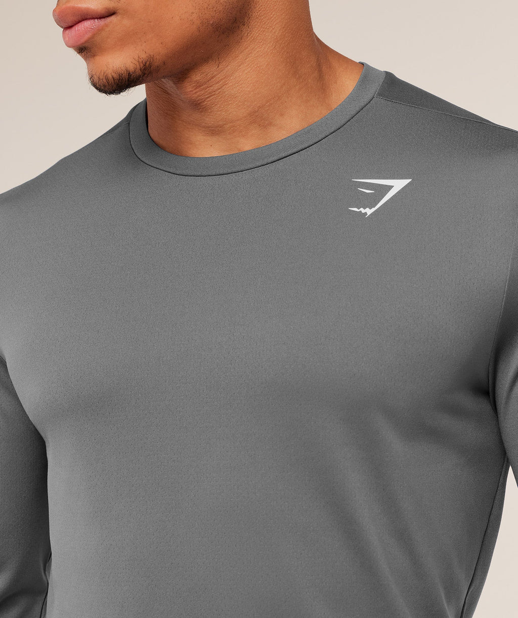 gymshark-arrival-long-sleeve-t-shirt-silhouette-grey-aw22