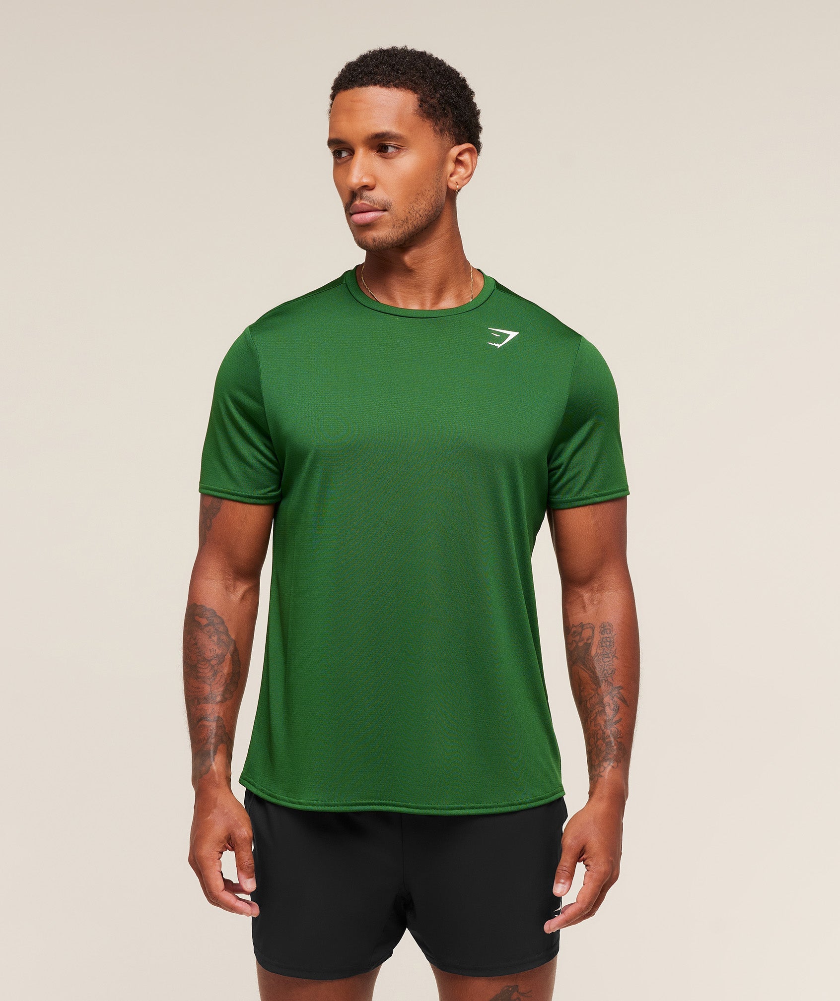 gymshark-arrival-regular-fit-t-shirt-ss-tops-green-aw25