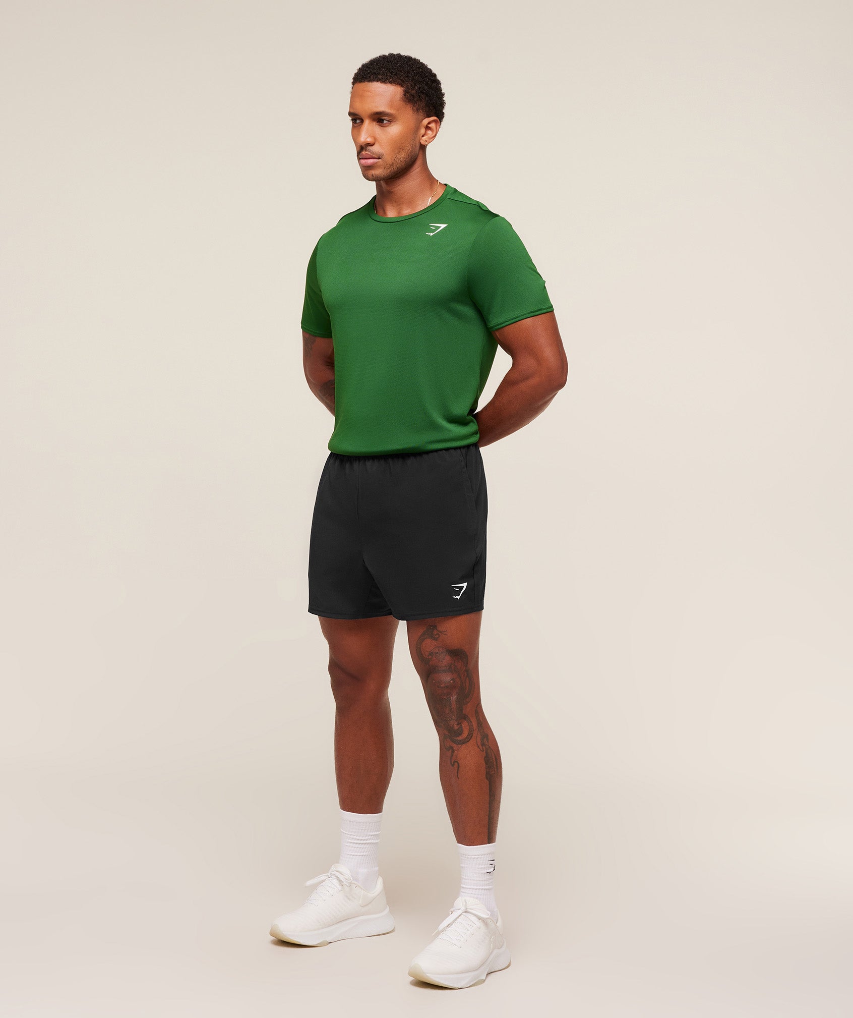 gymshark-arrival-regular-fit-t-shirt-ss-tops-green-aw25
