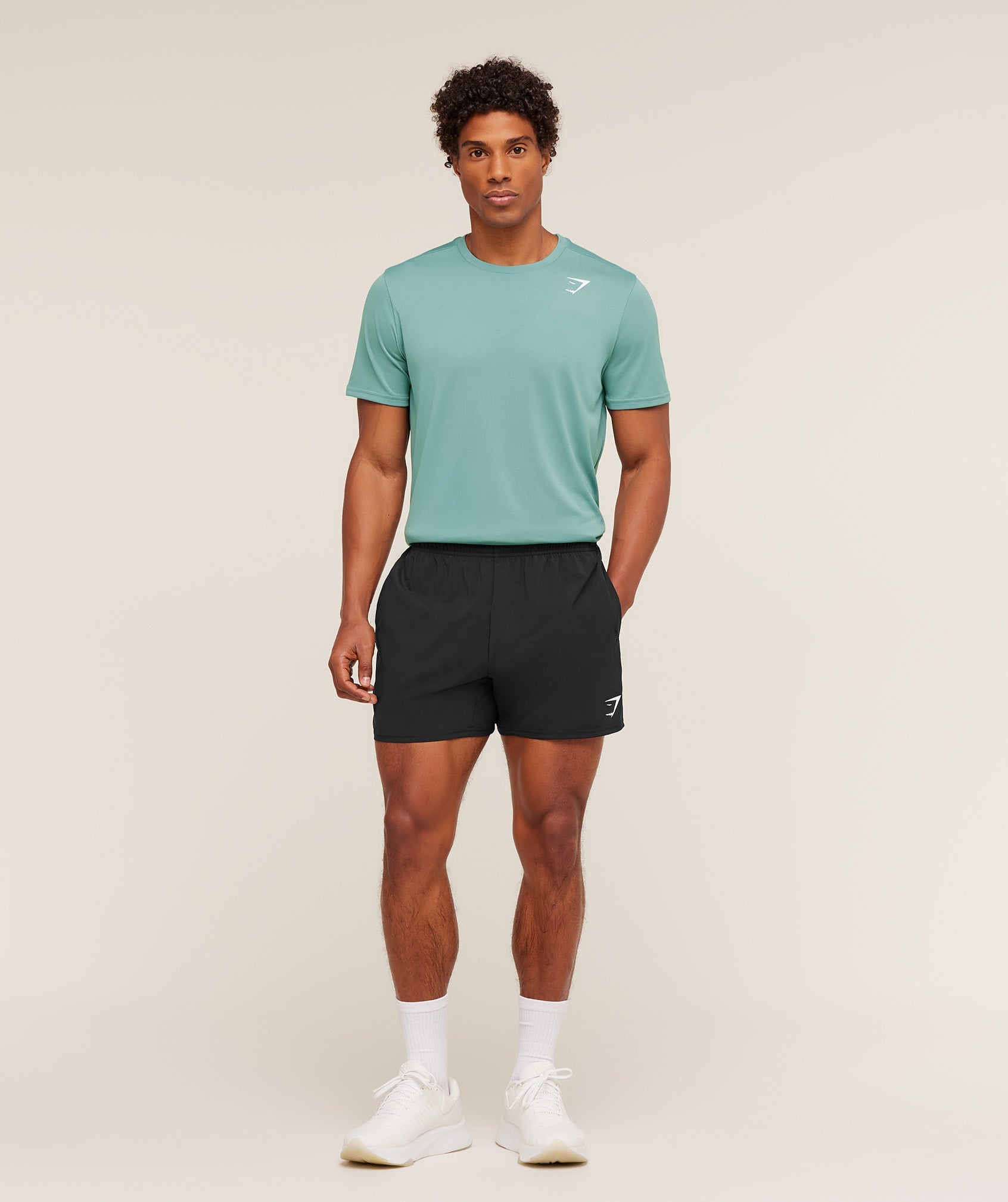 gymshark-arrival-regular-fit-t-shirt-ss-tops-teal-aw25
