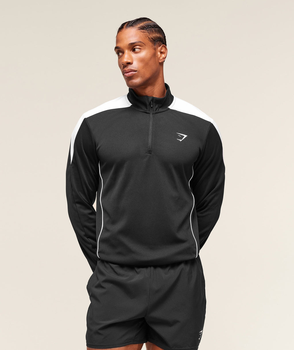 gymshark-arrival-block-1-4-zip-pullovers-black-aw25
