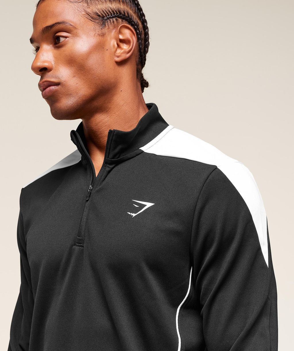 gymshark-arrival-block-1-4-zip-pullovers-black-aw25
