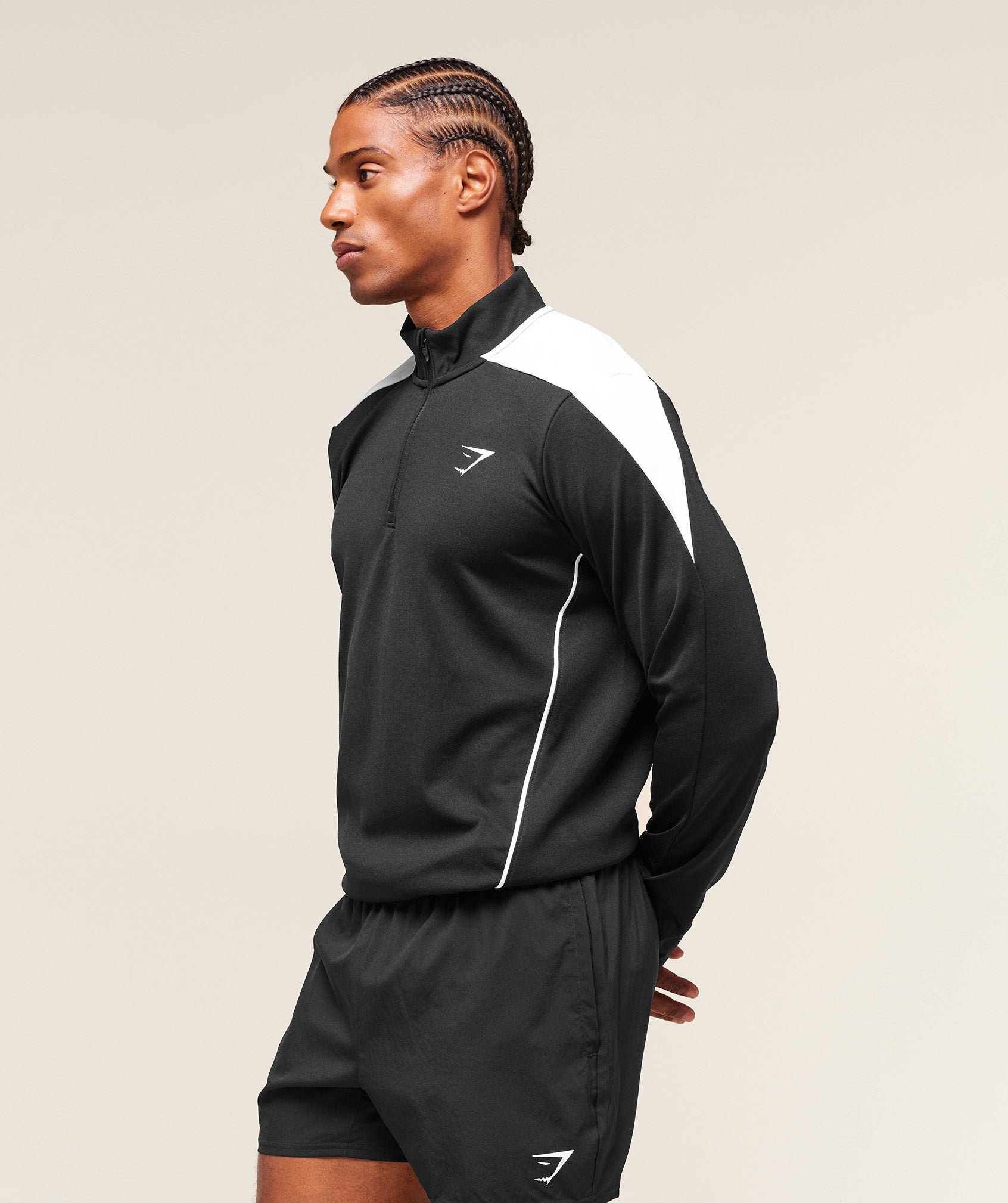 gymshark-arrival-block-1-4-zip-pullovers-black-aw25