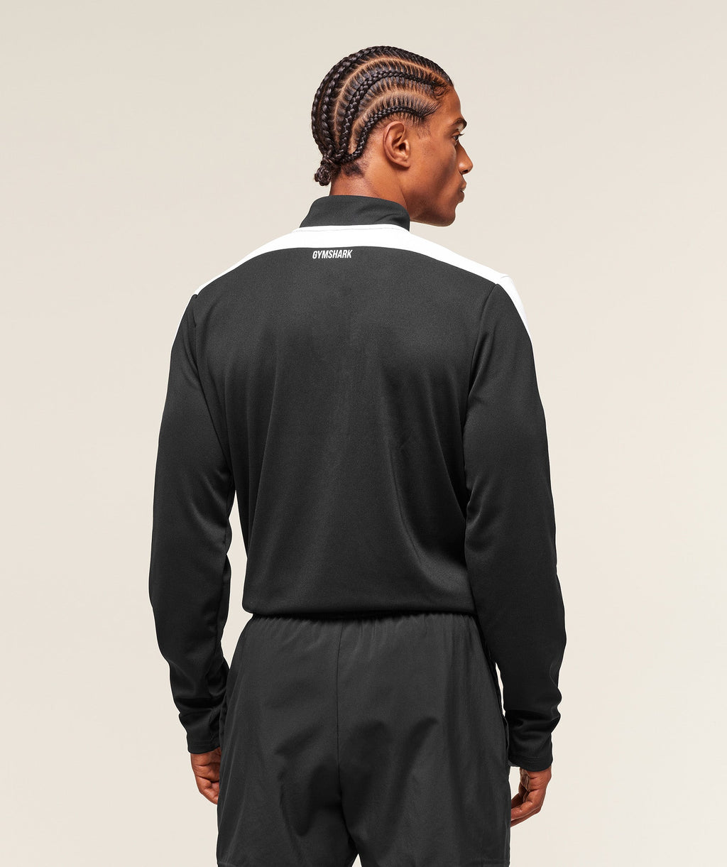 gymshark-arrival-block-1-4-zip-pullovers-black-aw25