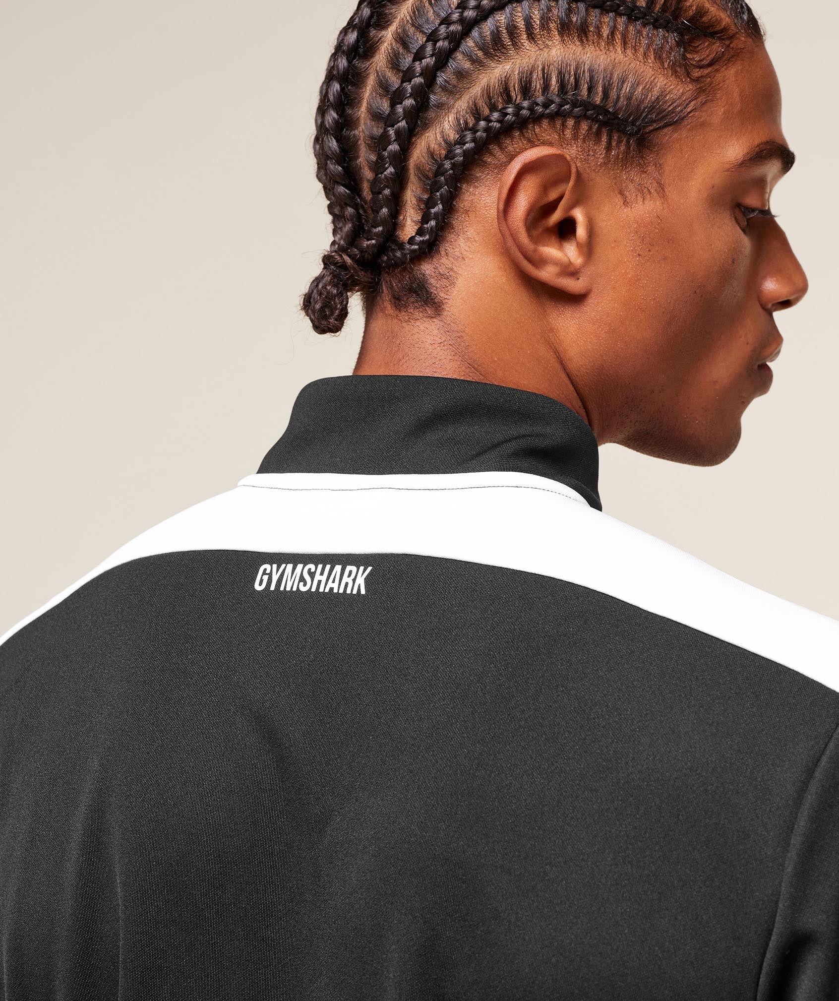 gymshark-arrival-block-1-4-zip-pullovers-black-aw25