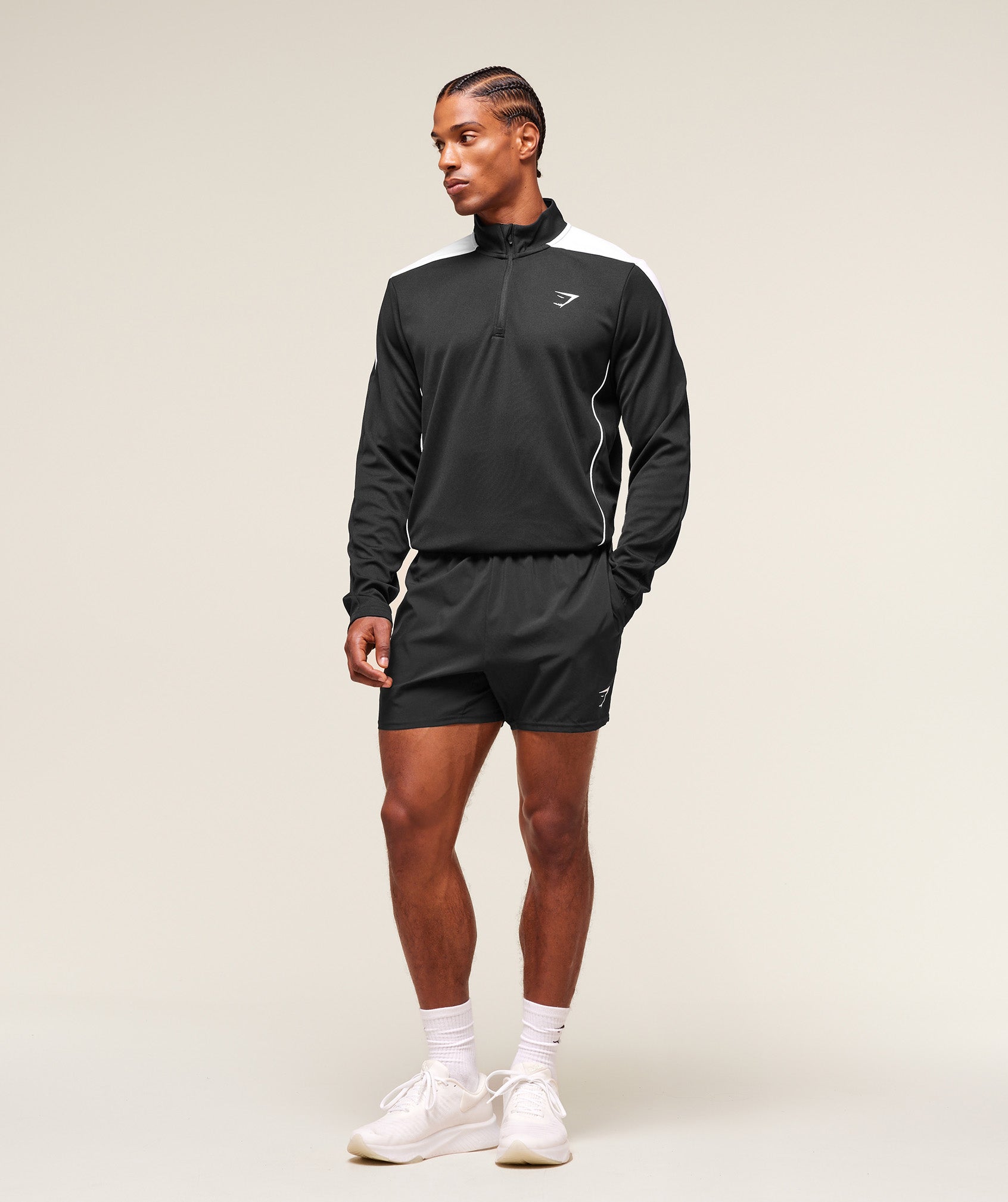 gymshark-arrival-block-1-4-zip-pullovers-black-aw25