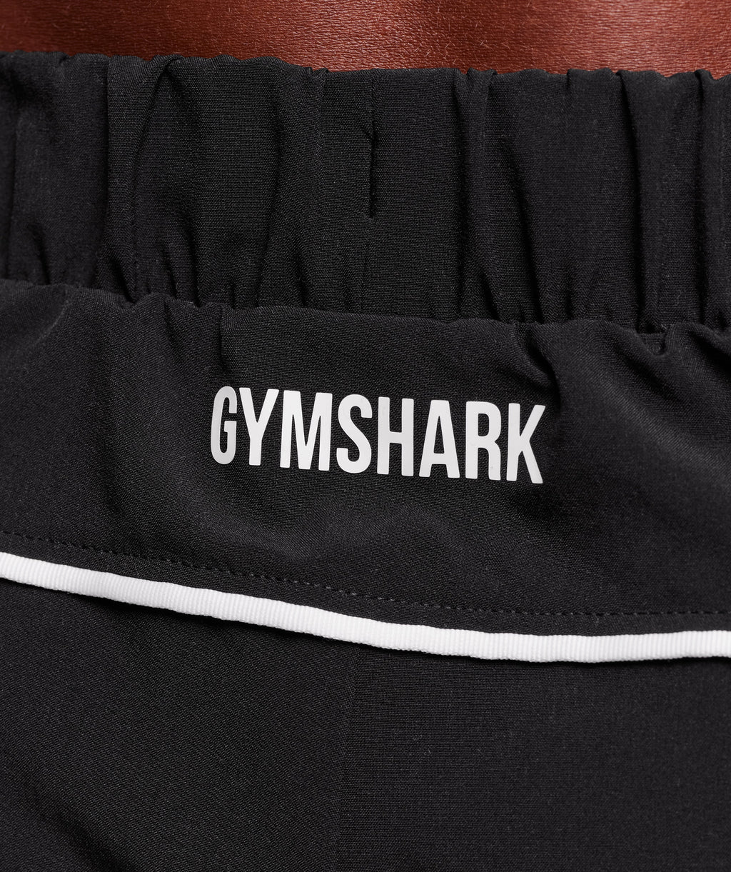 gymshark-arrival-woven-block-joggers-pants-black-aw25