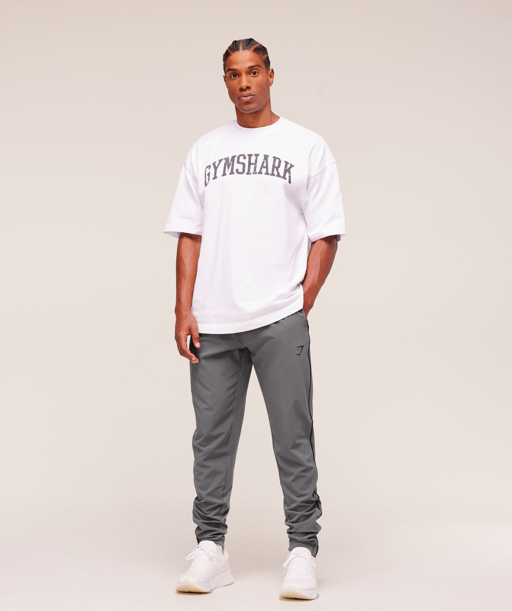 gymshark-arrival-woven-block-joggers-pants-grey-aw25
