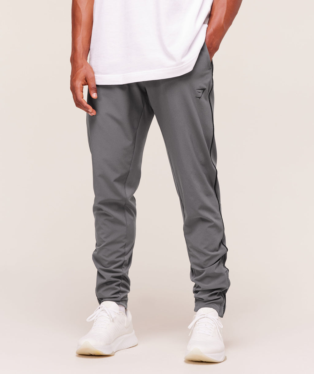 gymshark-arrival-woven-block-joggers-pants-grey-aw25