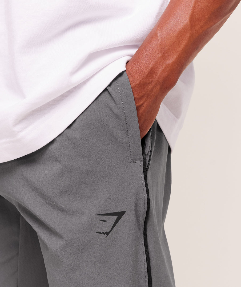 gymshark-arrival-woven-block-joggers-pants-grey-aw25