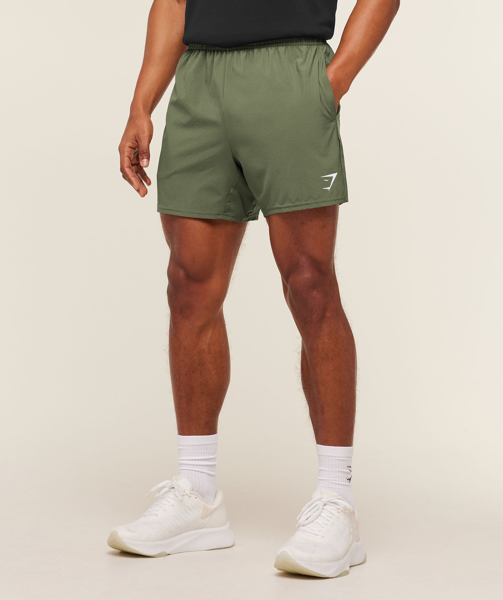 gymshark-arrival-5-shorts-core-olive-ss22