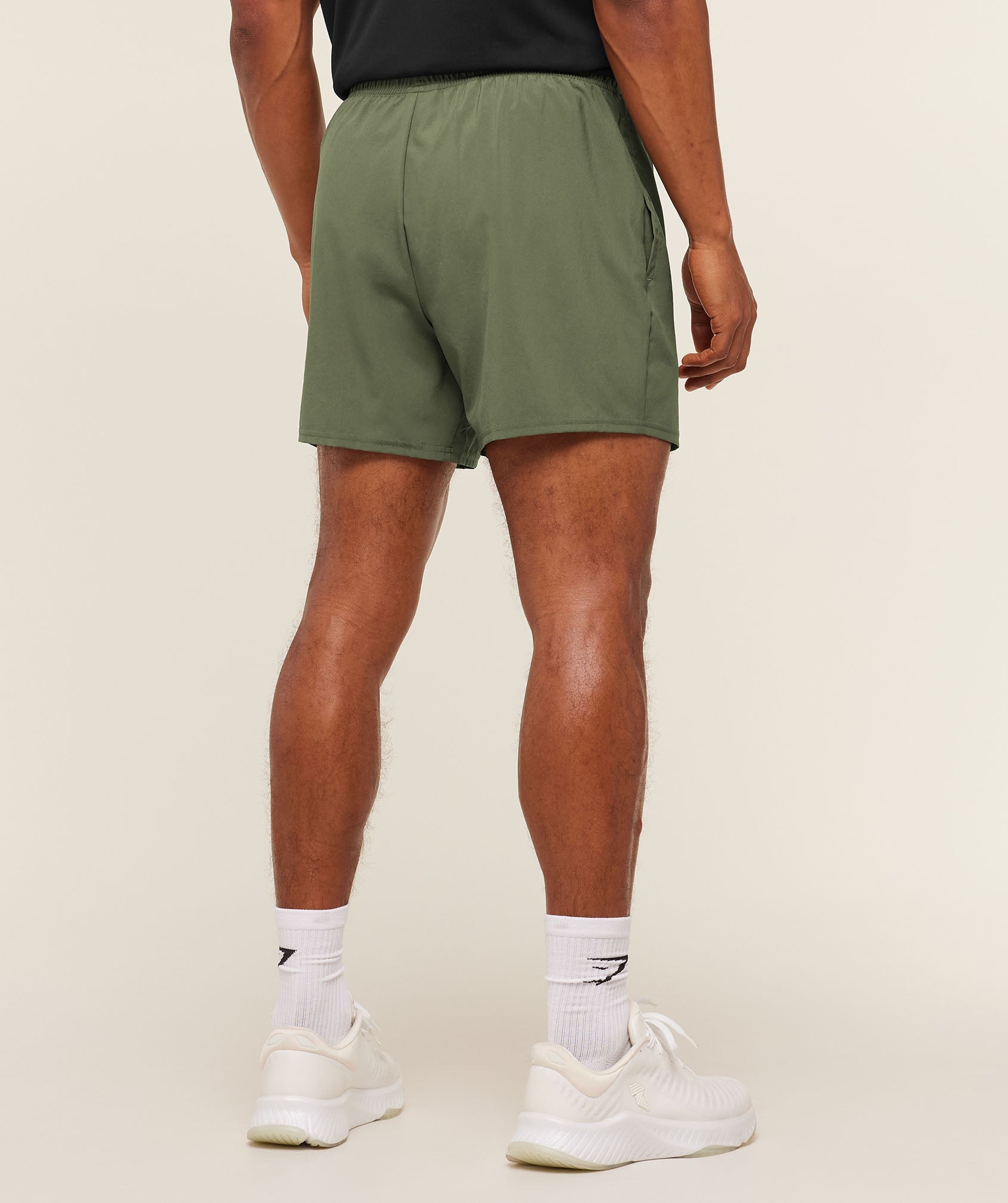gymshark-arrival-5-shorts-core-olive-ss22