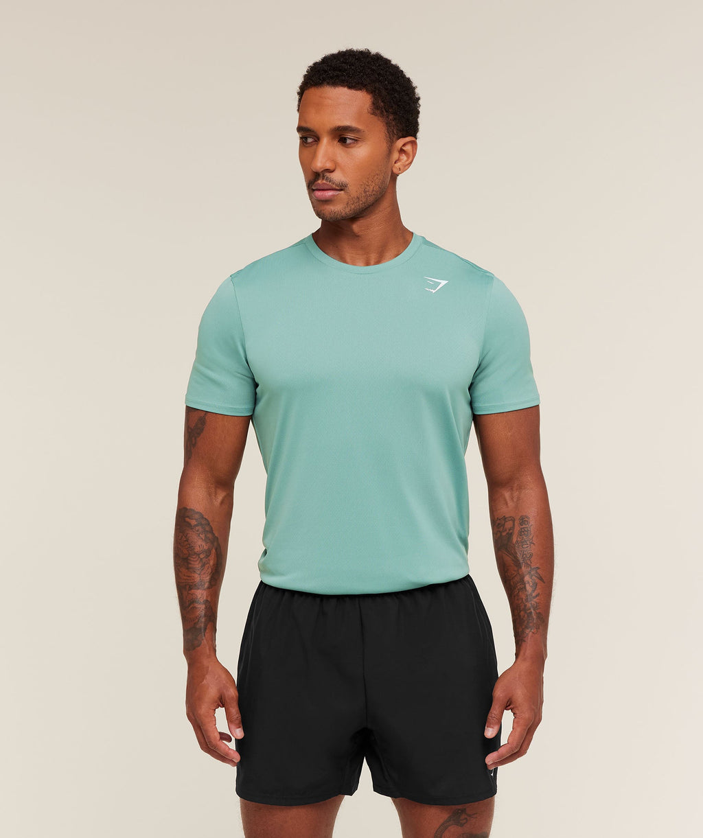 gymshark-arrival-t-shirt-ss-tops-teal-aw25