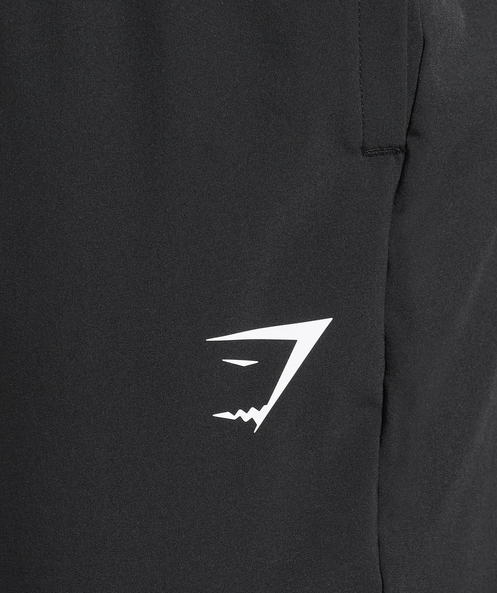 gymshark-arrival-woven-tall-joggers-black-ss25