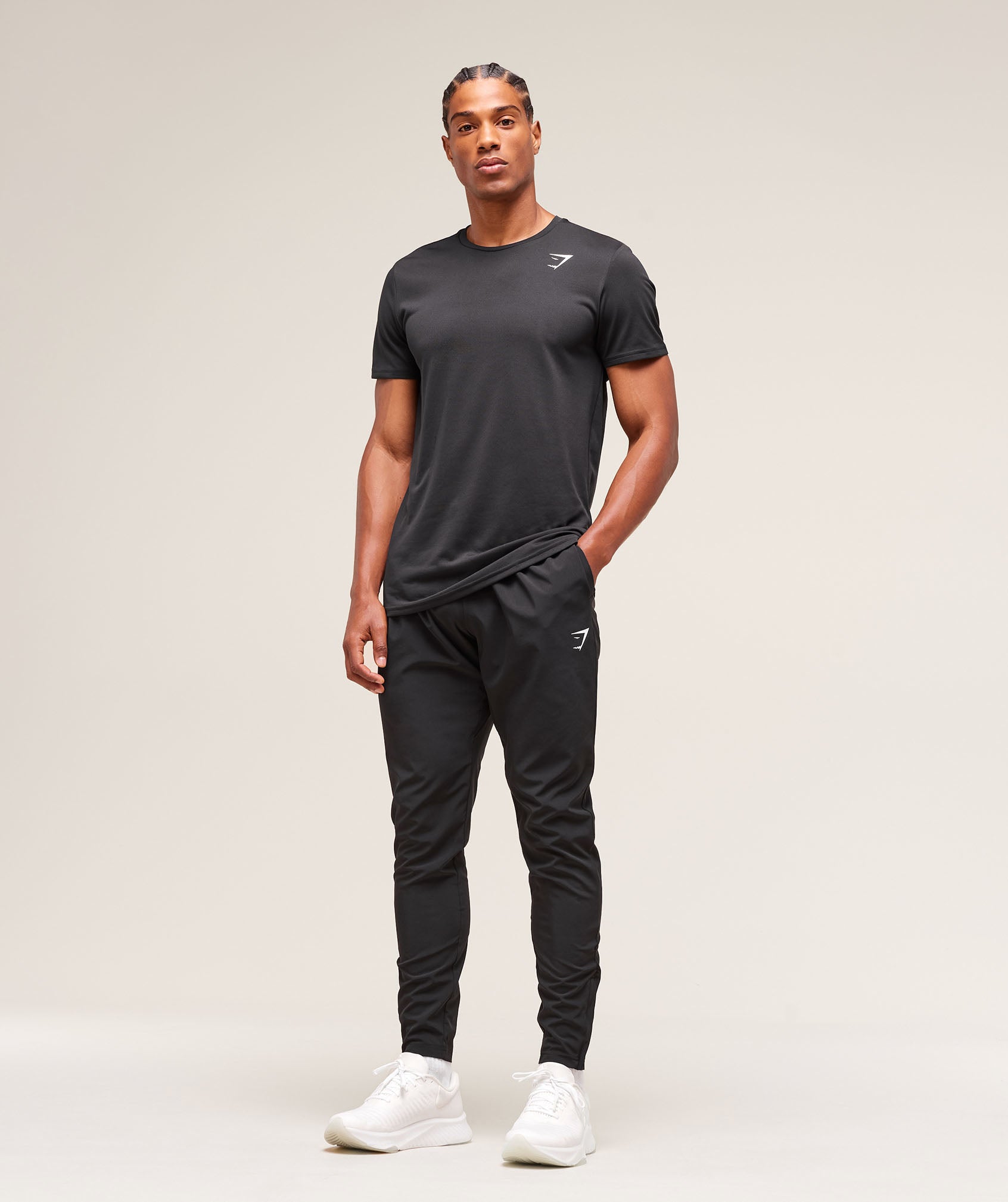 gymshark-arrival-woven-tall-joggers-black-ss25