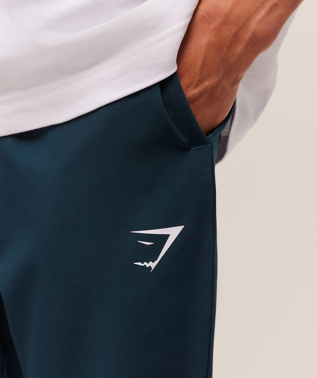 gymshark-arrival-woven-tall-joggers-pants-blue-aw25