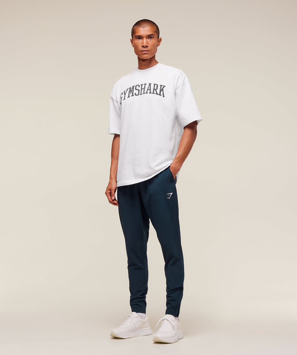 gymshark-arrival-woven-tall-joggers-pants-blue-aw25