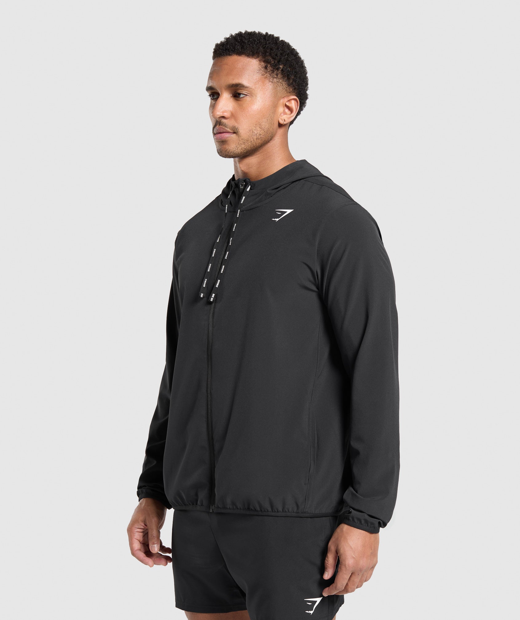 gymshark-arrival-track-jacket-jackets-outerwear-black-ss25