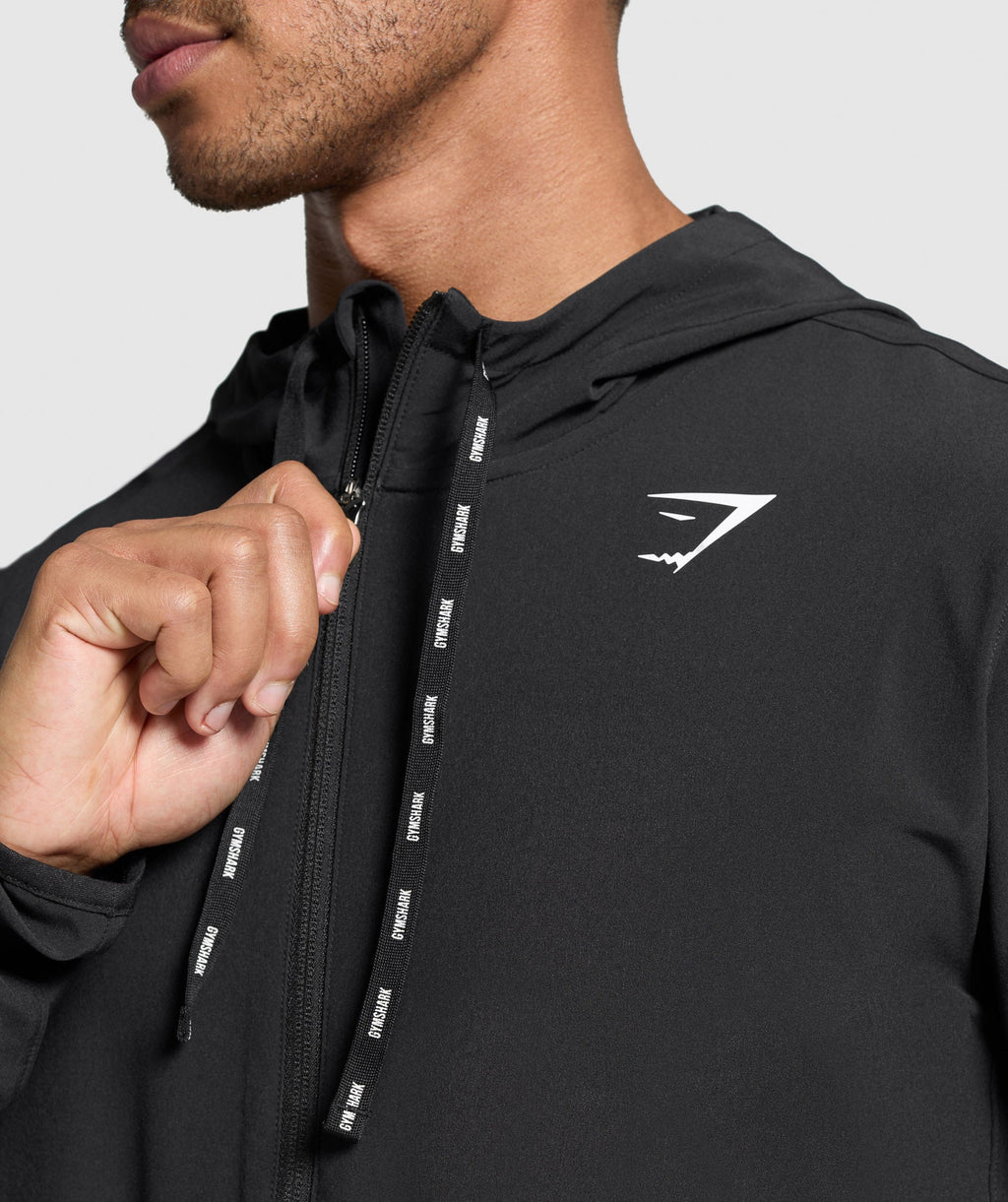 gymshark-arrival-track-jacket-jackets-outerwear-black-ss25