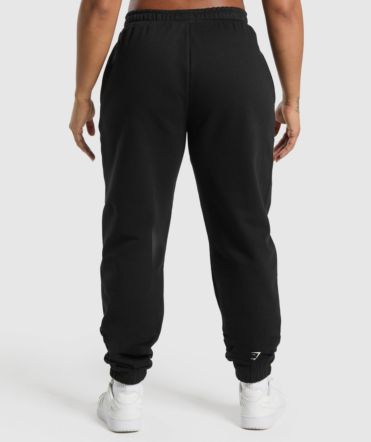 gymshark-lifting-essentials-graphic-brushed-oversized-joggers-black-ss25