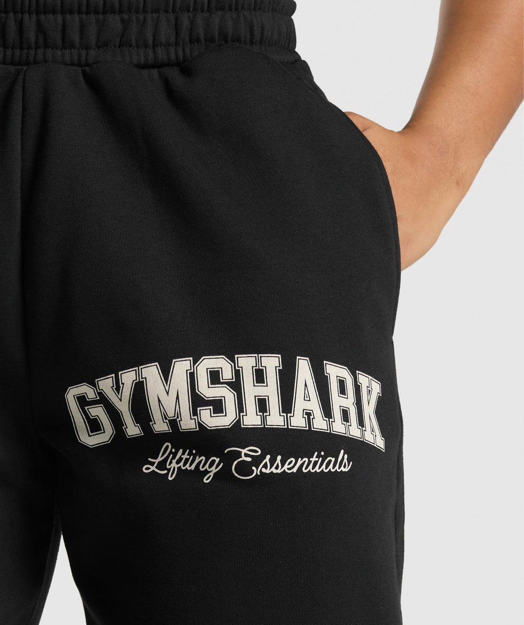 gymshark-lifting-essentials-graphic-brushed-oversized-joggers-black-ss25