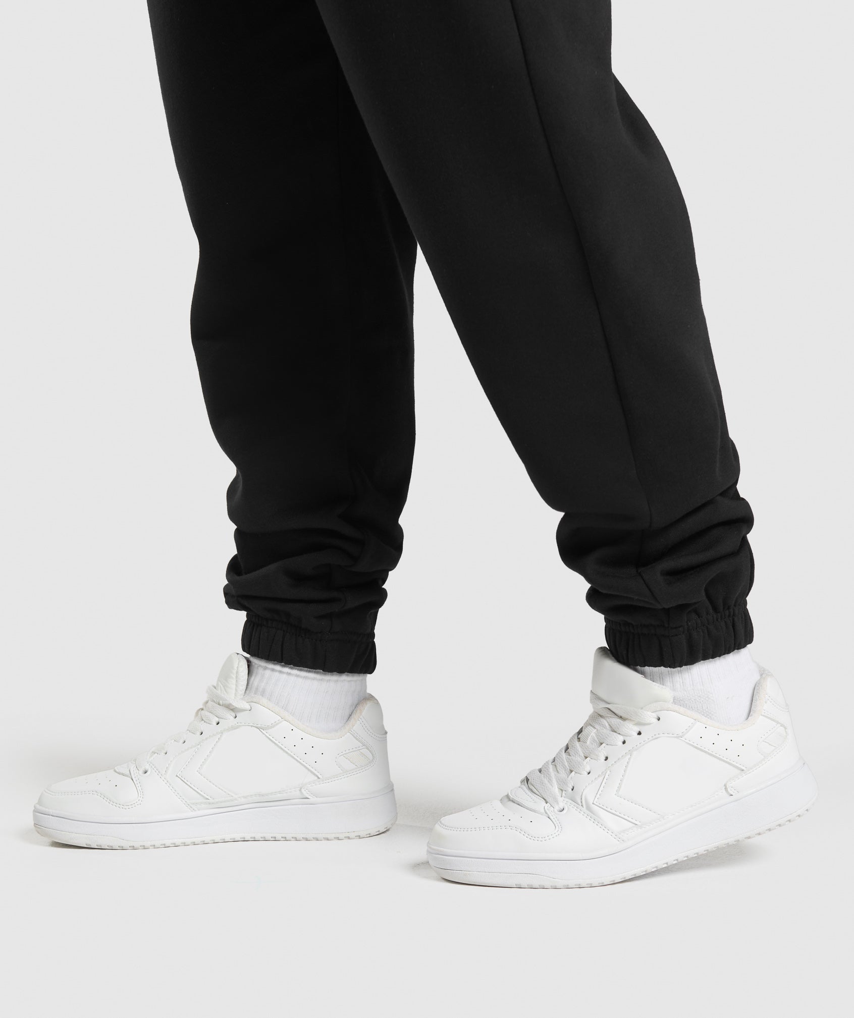 gymshark-lifting-essentials-graphic-brushed-oversized-joggers-black-ss25