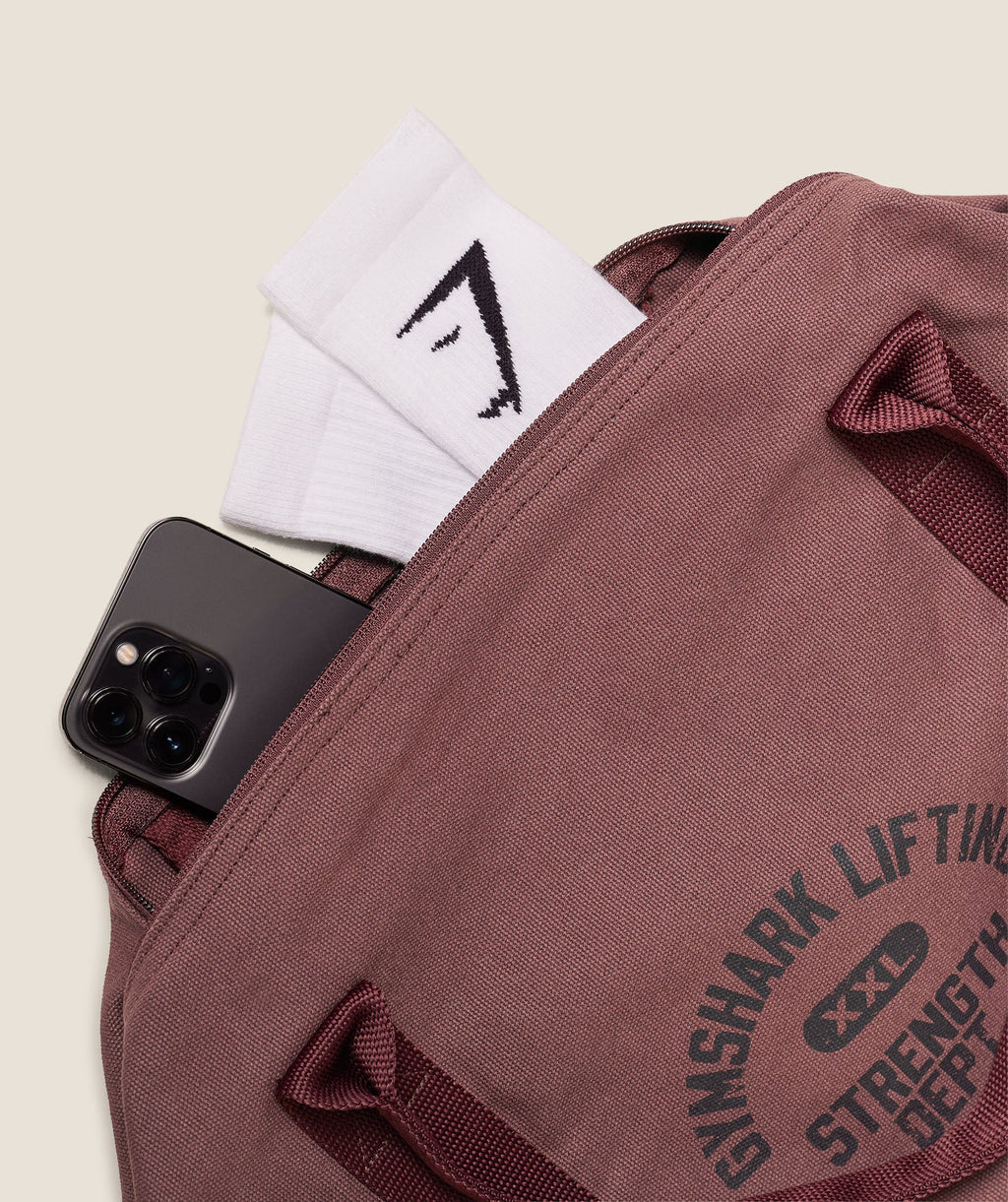 gymshark-strength-dept-canvas-duffle-bag-bags-red-aw25