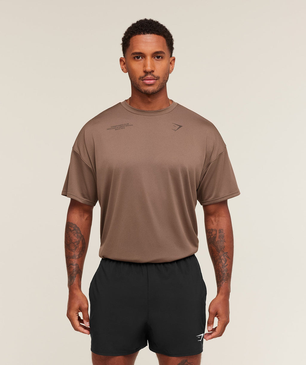 gymshark-conditioning-club-oversized-t-shirt-ss-tops-brown-aw25-1