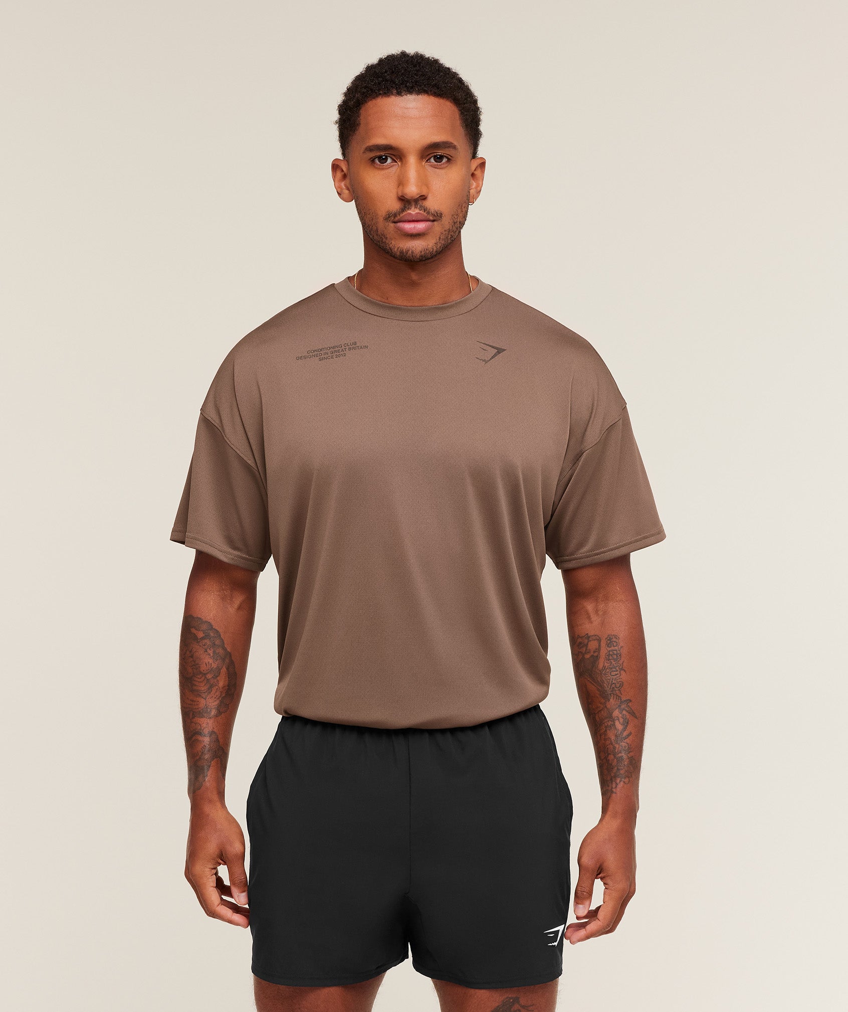 gymshark-conditioning-club-oversized-t-shirt-ss-tops-brown-aw25-1