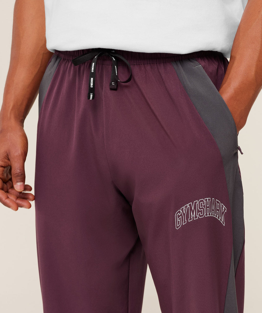 gymshark-collegiate-tech-pant-pants-red-ss26